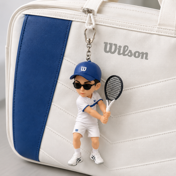 Personalized tennis player chibi sports keychain on a racket bag