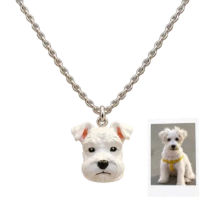 White dog photo recreated as a hand-painted 3D printed resin portrait pendant