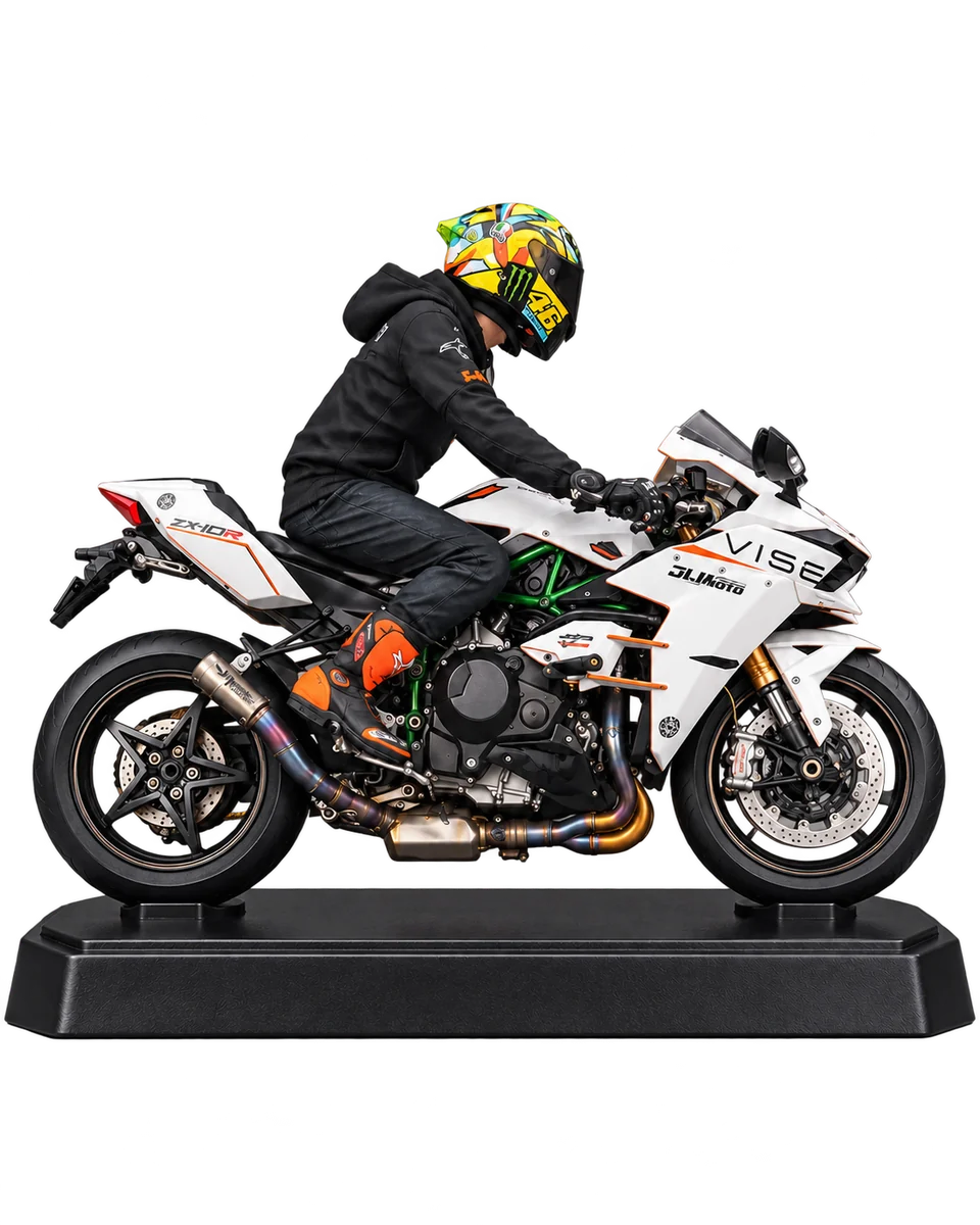 White and orange sport motorcycle miniature with a black-clad rider and orange boots